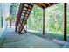Outdoor patio with wooden staircase and trees at 4066 Harvest Ridge Dr, Douglasville, GA 30135