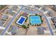 An aerial view of the community pool, playground and tennis courts at 5525 Nesmith Ct, Cumming, GA 30040