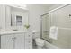 Well-lit bathroom with a shower over tub, modern vanity, and neutral tones at 151 John Christopher Dr, Alpharetta, GA 30009