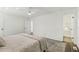 Inviting bedroom features neutral tones, a comfortable bed, and access to an ensuite bathroom at 151 John Christopher Dr, Alpharetta, GA 30009