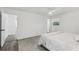 Minimalist bedroom design with a comfortable bed, clean lines, and ample natural light at 151 John Christopher Dr, Alpharetta, GA 30009