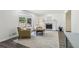Living room with hardwood floors, natural light and a fireplace at 151 John Christopher Dr, Alpharetta, GA 30009