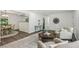 Bright living room features stylish decor, wood floors, and an open floor plan for seamless entertaining at 151 John Christopher Dr, Alpharetta, GA 30009
