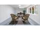 Home office with neutral walls, desk and chairs with natural lighting at 151 John Christopher Dr, Alpharetta, GA 30009