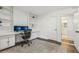 Bright office with a view to the bathroom, a modern desk chair and dual computer monitors at 151 John Christopher Dr, Alpharetta, GA 30009