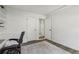 Modern office with natural light, built-in shelving, and ample storage at 151 John Christopher Dr, Alpharetta, GA 30009