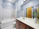 This neutral bathroom has a tub and shower combination and plenty of counter space at 2630 Talley St # 319, Decatur, GA 30030