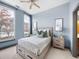 Bright bedroom with large windows, ceiling fan, and neutral decor at 2630 Talley St # 319, Decatur, GA 30030