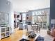 Open-concept with kitchen, breakfast nook, and living area with hardwood floors and stainless steel appliances at 2630 Talley St # 319, Decatur, GA 30030