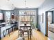 Open concept living space features stainless steel appliances and views of a private balcony at 2630 Talley St # 319, Decatur, GA 30030