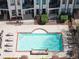 Aerial view of the sparkling pool, complete with lounge chairs for relaxing at 2630 Talley St # 319, Decatur, GA 30030