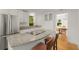 Bright and modern kitchen featuring granite countertops, stainless steel appliances, and a convenient island at 374 8Th Ne St, Atlanta, GA 30309
