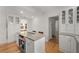 Modern kitchen with stainless steel appliances, granite countertops, and ample cabinet space for storage at 374 8Th Ne St, Atlanta, GA 30309