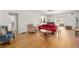Open-concept living room with hardwood floors, classic details, and a cozy atmosphere at 374 8Th Ne St, Atlanta, GA 30309