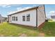 Exterior view of the home's rear facade and backyard at 7757 Sheffield Ter, Fairburn, GA 30213