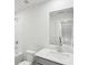 Bright and modern bathroom featuring a vanity, toilet, tub and shower at 7757 Sheffield Ter, Fairburn, GA 30213