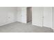 Bedroom featuring neutral carpeting and bright white walls at 7757 Sheffield Ter, Fairburn, GA 30213