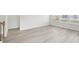 Bright living space with a staircase, large windows, and modern flooring for a cozy atmosphere at 7757 Sheffield Ter, Fairburn, GA 30213