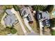 Aerial view of neighborhood featuring well manicured lawns, mature trees, and circular driveways at 3318 Monceau Way, Roswell, GA 30075