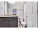 Bathroom with granite vanity, undermount sink, new gray cabinets, and tile flooring at 3318 Monceau Way, Roswell, GA 30075