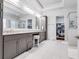 Luxurious bathroom featuring double vanity, walk-in closet and shower at 3318 Monceau Way, Roswell, GA 30075
