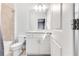 Bright bathroom with white cabinets, granite countertop, and shower with tile surround at 3318 Monceau Way, Roswell, GA 30075
