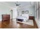 Spacious main bedroom with tray ceilings, hardwood floors, and plenty of natural light at 3318 Monceau Way, Roswell, GA 30075