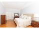 Bright main bedroom features wood floors and a beautiful ceiling with natural light and closet at 4579 Blakedale Ne Cir, Roswell, GA 30075