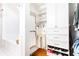Bright walk-in closet featuring custom shelving and organization options with space for clothing and shoes at 4579 Blakedale Ne Cir, Roswell, GA 30075
