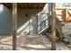 Backyard with a door to basement and stone path at 6424 Barker Station Walk, Sugar Hill, GA 30518