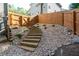 Backyard with stone and wood stairs to upper yard at 6424 Barker Station Walk, Sugar Hill, GA 30518