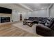Spacious finished basement featuring a stone fireplace, comfortable seating, and ample room for entertainment at 125 Mayo Rd, Covington, GA 30014
