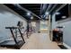This gym has a treadmill and weight training equipment, perfect for staying active at home at 125 Mayo Rd, Covington, GA 30014