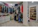 Walk-in closet offering custom shelving, drawers, and plenty of room for storage at 125 Mayo Rd, Covington, GA 30014
