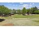 Wide park view featuring green space, a gazebo, playground, and trees, for outdoor enjoyment at 1605 Gilstrap Nw Ln, Atlanta, GA 30318