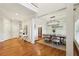 Spacious dining area with hardwood floors, modern lighting, and convenient access to the kitchen at 1605 Gilstrap Nw Ln, Atlanta, GA 30318