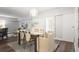 Elegant dining room with a stylish table, chandelier, and access to living area at 3648 Peachtree Ne Rd # 2Q, Atlanta, GA 30319