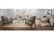 Comfortable living room with stylish seating, neutral colors, and hardwood floors at 3648 Peachtree Ne Rd # 2Q, Atlanta, GA 30319
