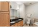 Bathroom with double sink vanity, a large mirror, and separate bathtub at 375 Highland Ne Ave # 1011, Atlanta, GA 30312