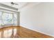 Bedroom with hardwood floors, ceiling fan, and bay windows at 375 Highland Ne Ave # 1011, Atlanta, GA 30312