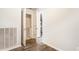 A bright laundry area with washer, dryer, and overhead storage and shelving at 375 Highland Ne Ave # 1011, Atlanta, GA 30312