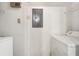 Laundry area featuring a washing machine and dryer and wire rack shelving at 375 Highland Ne Ave # 1011, Atlanta, GA 30312