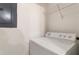 Laundry area featuring a washing machine and dryer and wire rack shelving at 375 Highland Ne Ave # 1011, Atlanta, GA 30312