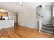 Bright, open-concept living area showcasing hardwood floors and easy access to the kitchen at 375 Highland Ne Ave # 1011, Atlanta, GA 30312