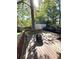 This home has a lovely wooden deck with a built-in fire pit for outdoor living and relaxation at 4257 Webb Rd, Tucker, GA 30084
