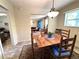 The dining area features wainscotting and a view into the living room at 4257 Webb Rd, Tucker, GA 30084