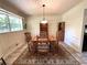 This dining room offers seating for six and a view into the kitchen at 4257 Webb Rd, Tucker, GA 30084