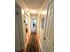 Hallway featuring new lighting and a decorative rug at 4257 Webb Rd, Tucker, GA 30084