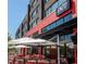 Exterior view of Enzo Steakhouse & Bar with inviting outdoor patio seating at 100 Carlyle Ln, Fayetteville, GA 30214