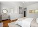 Bright bedroom features hardwood floors, neutral decor and vaulted ceiling at 1233 Ashford Creek Ne Park, Atlanta, GA 30319